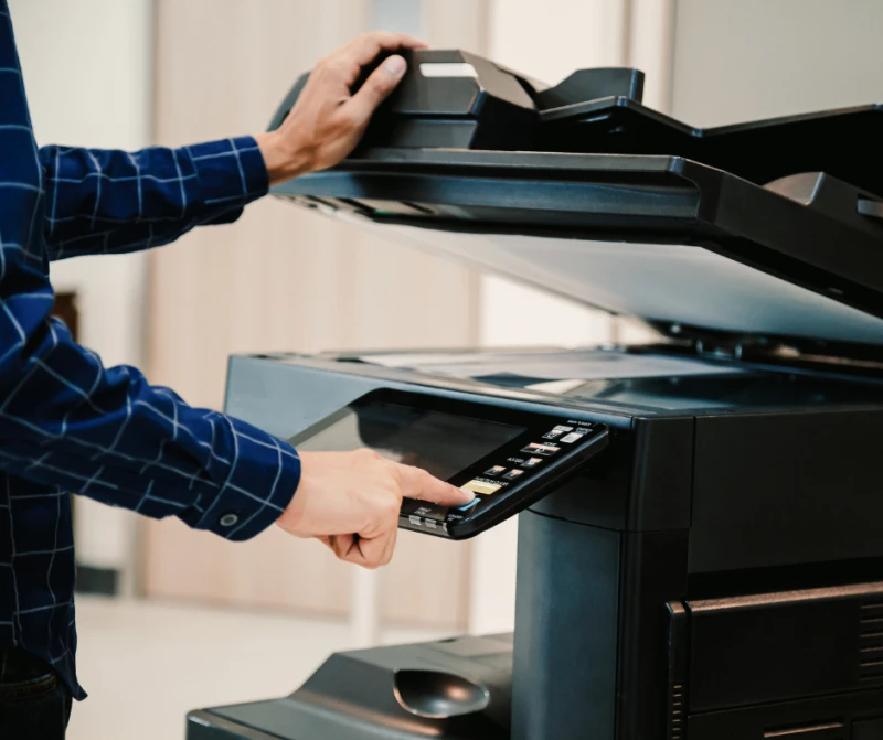 Male with photocopier.png