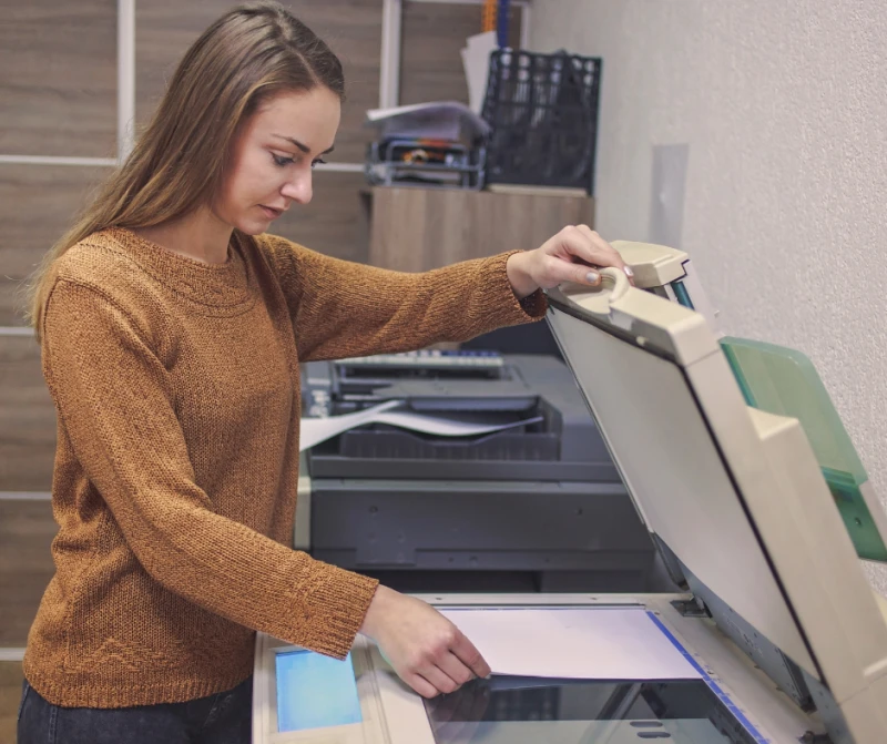 Female with photocopier.png